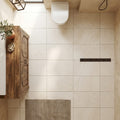 Ivory / Light Travertine 16x24 Cream Tumbled tile — Bathroom floor