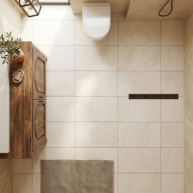 Ivory / Light Travertine 16x24 Cream Tumbled tile — Bathroom floor