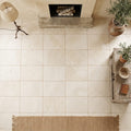Ivory / Light Travertine 16x24 Cream Tumbled tile — Living Room floor