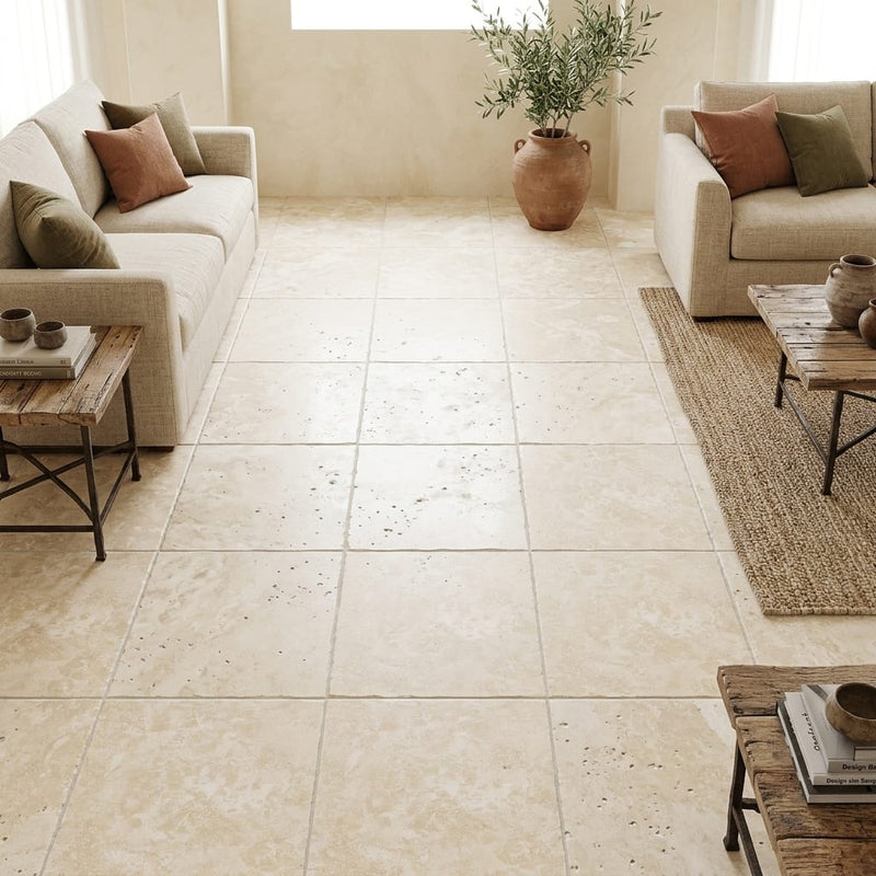 Ivory / Light Travertine 18x18 Cream Unfilled, Brushed & Chiseled Tile — Family Room floor