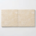 Ivory / Light Travertine 24x24 Cream Tumbled Paver close-up