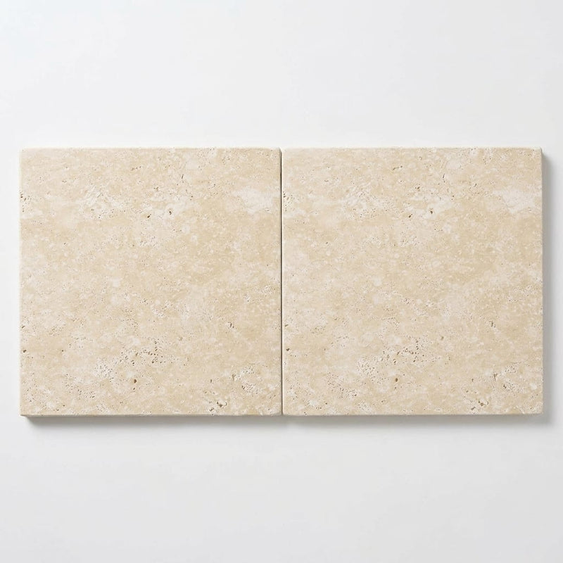 Ivory / Light Travertine 24x24 Cream Tumbled Paver close-up