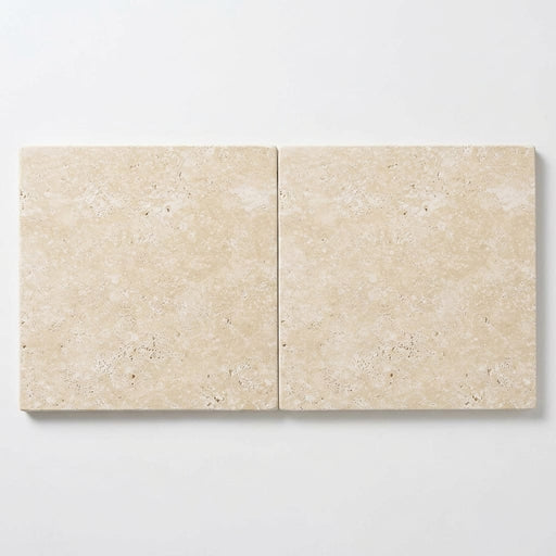 Ivory / Light Travertine 24x24 Cream Tumbled Paver close-up