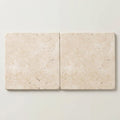 Ivory / Light Travertine 24x24 Cream Tumbled Tile close-up