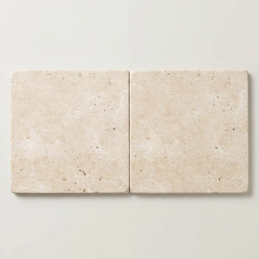 Ivory / Light Travertine 24x24 Cream Tumbled Tile close-up