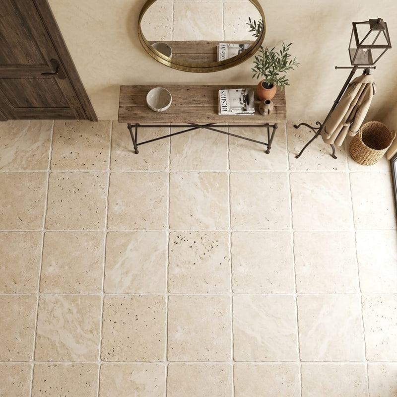 Ivory / Light Travertine 24x24 Cream Tumbled Tile — Foyer floor