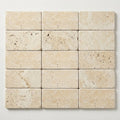 Ivory / Light Travertine 3x6 Cream Tumbled Tile close-up