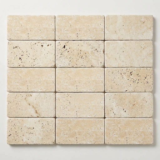 Ivory / Light Travertine 3x6 Cream Tumbled Tile close-up