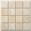 Ivory / Light Travertine 4x4 Cream Tumbled Tile close-up
