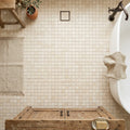Ivory / Light Travertine 5/8x5/8 Cream Tumbled Mosaic — Bathroom floor