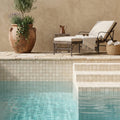 Ivory / Light Travertine 5/8x5/8 Cream Tumbled Mosaic — Swimming Pool pool interior tiling