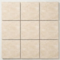 Ivory / Light Travertine 8x8 Cream Unfilled, Brushed & Chiseled Tile close-up