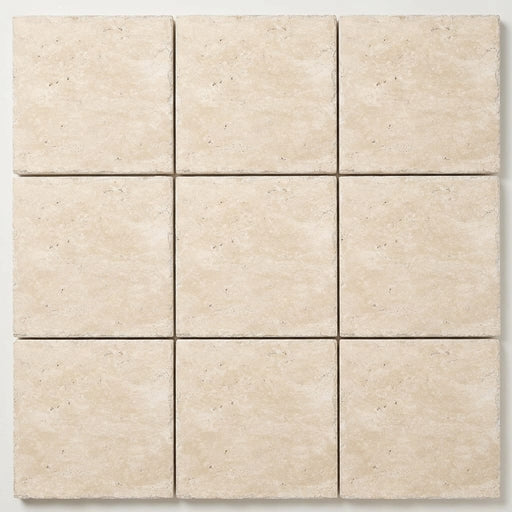 Ivory / Light Travertine 8x8 Cream Unfilled, Brushed & Chiseled Tile close-up