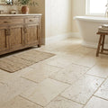 Ivory Travertine Tile 16x24 Brushed Chiseled — Primary Bath floor