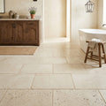 Ivory Travertine Tile 16x24 Tumbled — Primary Bath floor