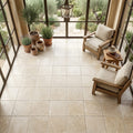 Ivory Travertine Tile 18x18 Brushed Chiseled — Sunroom floor
