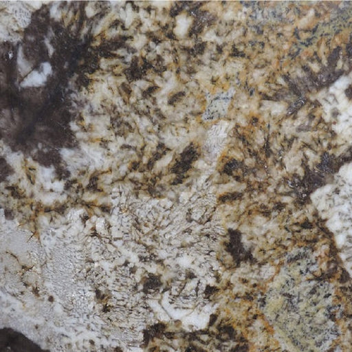 Jaguar granite slab with white, gold and dark mineral patterns.