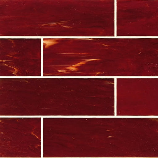 Kiss My Big Fat Glass Bootyful Crimson 4x16 glass tile with golden streaks in a staggered brick layout.