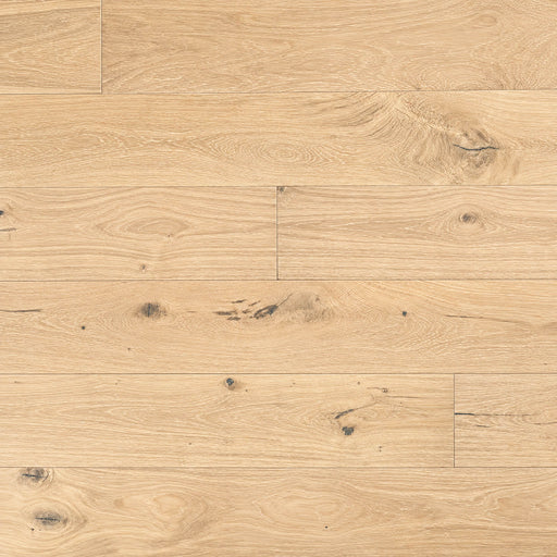 Ladson Whitlock 7x74 brushed genuine hardwood planks with light warm beige tones, natural knots and subtle white grain in a horizontal staggered layout.