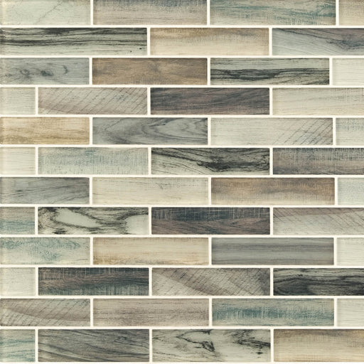 Lazio Brick 1x4 glass mosaic tile featuring staggered rectangular pieces in beige, gray, ivory, and muted green with wood-grain patterns.