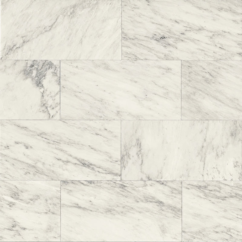 London Calling Cloudy 12x24 honed stone tiles with soft gray veining on an ivory background in a staggered layout.