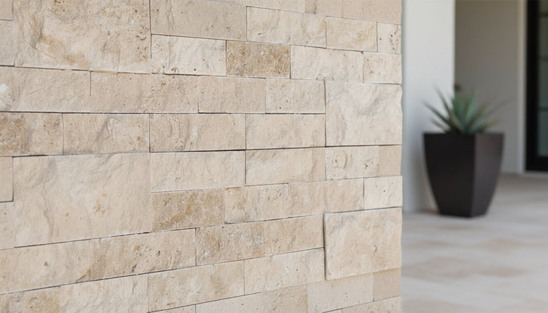 Close-up of Natural Cordoba Cream - Light Travertine Split Face 6 x 24 Flat Panel Stone Veneer, in Natural tones.