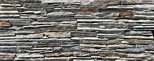 Close-up of Natural Stone Desert Sand Split Face 6 x 24 Flat Panel Stone Veneer, in Natural tones.