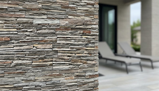 Close-up of Natural Stone Desert Sand Split Face 6 x 24 Flat Panel Stone Veneer, in Natural tones.