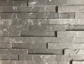 Close-up of Natural Stone Equator Split Face 6 x 24 Flat Panel Stone Veneer, in Natural tones.