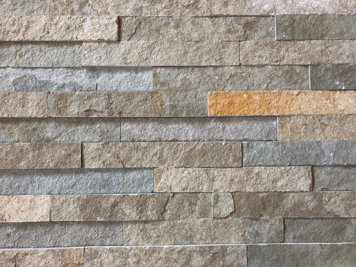 Close-up of Natural Stone French Vanilla Split Face 6 x 24 Flat Panel Stone Veneer, in Natural tones.