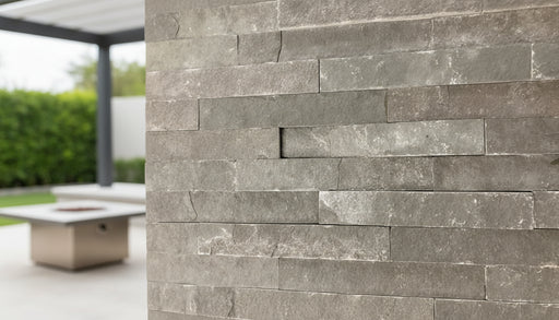 Close-up of Natural Stone INDIAN(LIME) Black Split Face 6 x 24 Flat Panel Stone Veneer, in Natural tones.