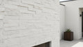 Close-up of Natural Stone Carrara White Split Face 6 x 24 Flat Panel Stone Veneer, in Natural tones.