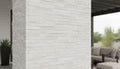 Close-up of Natural Stone White Carrera Splitface Split Face 6 x 24 Flat Panel Stone Veneer, in Natural tones.