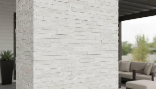Close-up of Natural Stone White Carrera Splitface Split Face 6 x 24 Flat Panel Stone Veneer, in Natural tones.