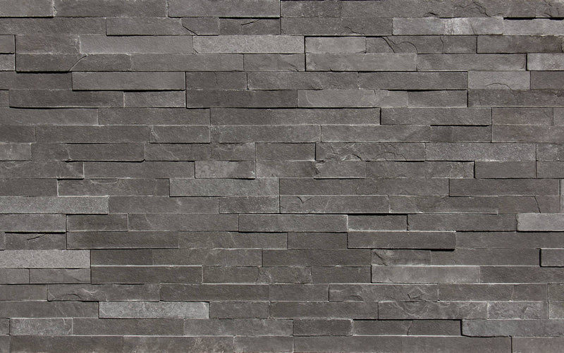 Close-up of Natural Stone Sea Grass Split Face 6 x 24 Flat Panel Stone Veneer, in Natural tones.