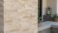 Close-up of Cordoba Cream - Light Travertine Travertine Split Face 6 x 18 x 6 L Shape Glued Corner Stone Veneer, in Cordoba Cream - Light Travertine tones.