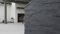 Close-up of Indian Bluestone Bluestone Split Face 6 x 18 x 6 (2 Pc) Dog Ear Corner Stone Veneer, in Indian Bluestone tones.