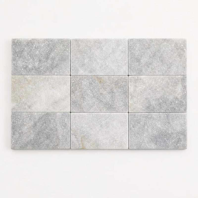 Lusso Carrara 10x5.75x06 Split-Face Marble Corner 6x12 close-up