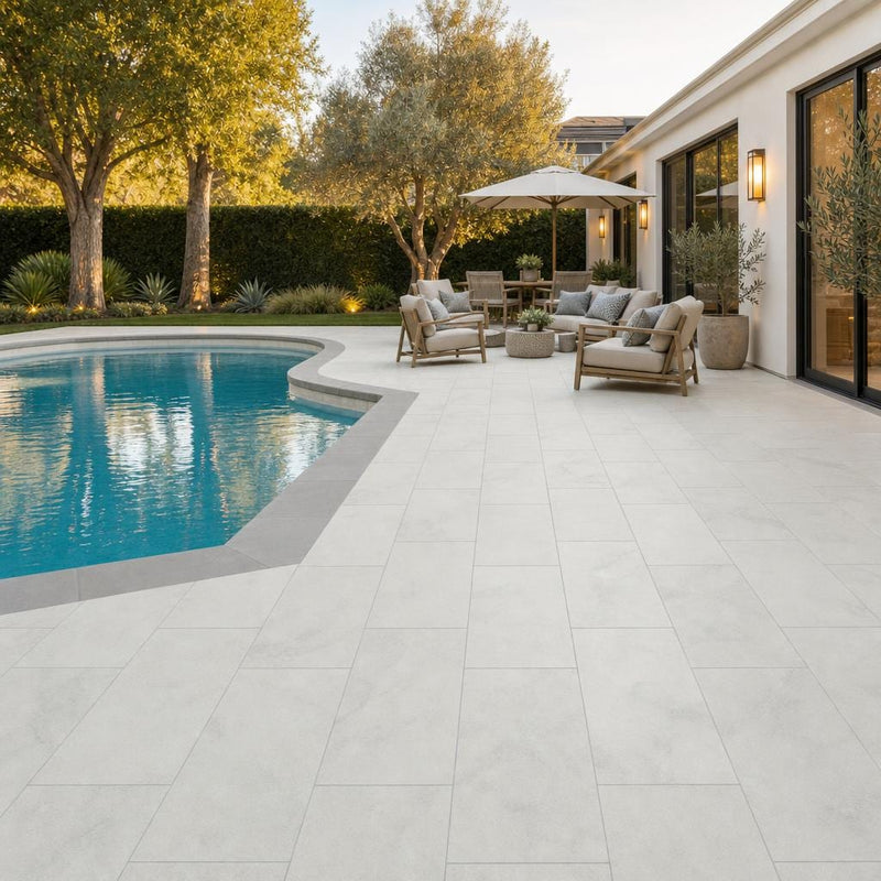 Lusso Carrara 12x24 Sandblasted Marble Paver — Backyard pool deck