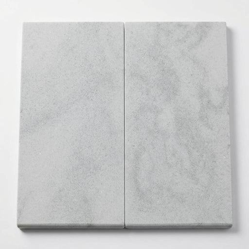 Lusso Carrara 12x24 Sandblasted Marble Single Bullnose Pool Coping close-up
