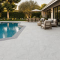 Lusso Carrara 16x24 Sandblasted Marble Paver — Backyard pool deck