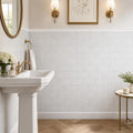 Lusso Carrara 3x6 Tumbled Marble Tile — Powder Room wainscot