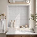 Lusso Carrara 4x4 Tumbled Marble Tile — Bathroom niche