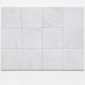 Lusso Carrara 4x4 Tumbled Marble Tile close-up