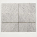 Lusso Carrara 6x6 Tumbled Marble Tile close-up