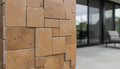 Close-up of Noce Toros Travertine Tumbled Micro Mini Mosaic, in Noce tones.