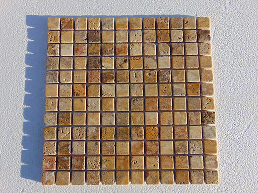 Close-up of Autumn Leaves Scabos Travertine Tumbled 1 x 1 Mosaic, in Autumn tones.