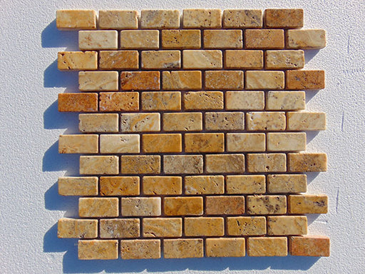 Close-up of Autumn Leaves Scabos Travertine Tumbled 1 x 2 Mosaic, in Autumn tones.