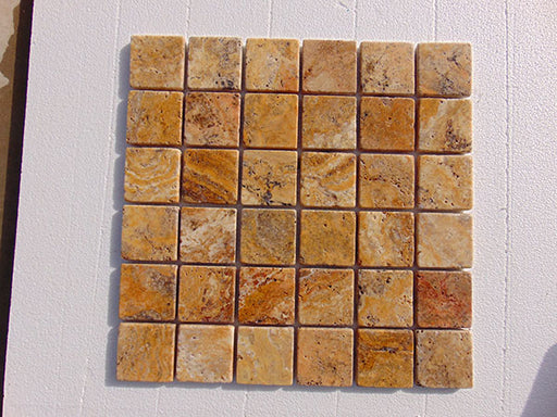 Close-up of Autumn Leaves Scabos Travertine Tumbled 2 x 2 Mosaic, in Autumn tones.