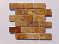 Close-up of Autumn Leaves Scabos Travertine Tumbled 2 x 4 Mosaic, in Autumn tones.
